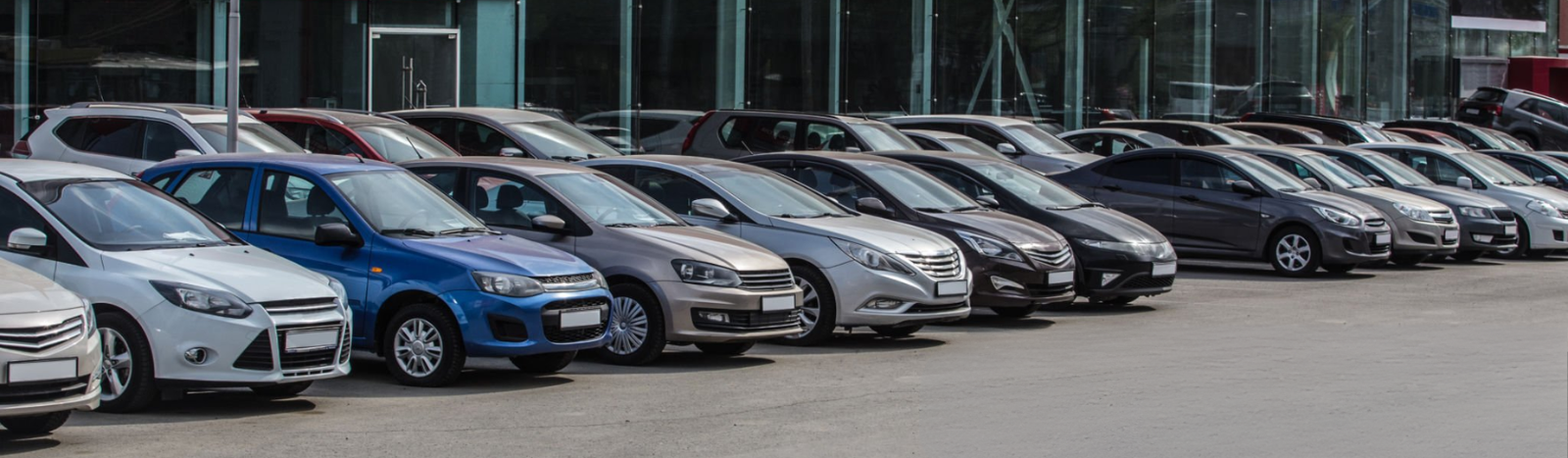 Multiple vehicles awaiting LPG conversion services at West Midlands garage